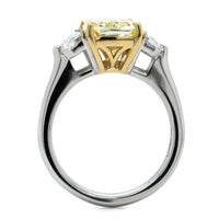 Platinum and 18K Yellow Gold 3 Stone Fancy Yellow Diamond Ring
