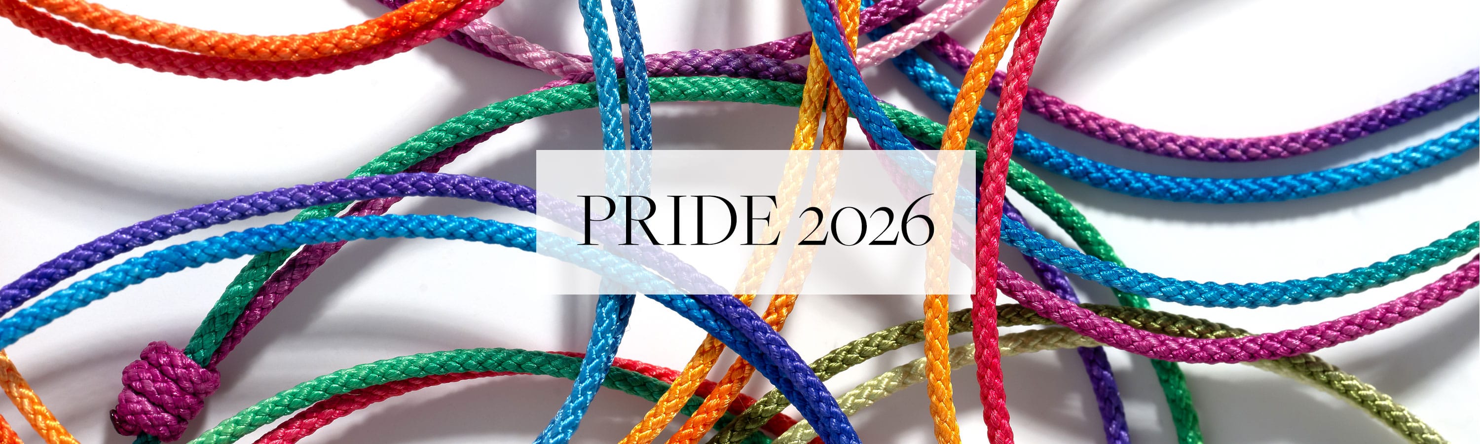 Rainbow cord bracelets with Pride 2026 Text