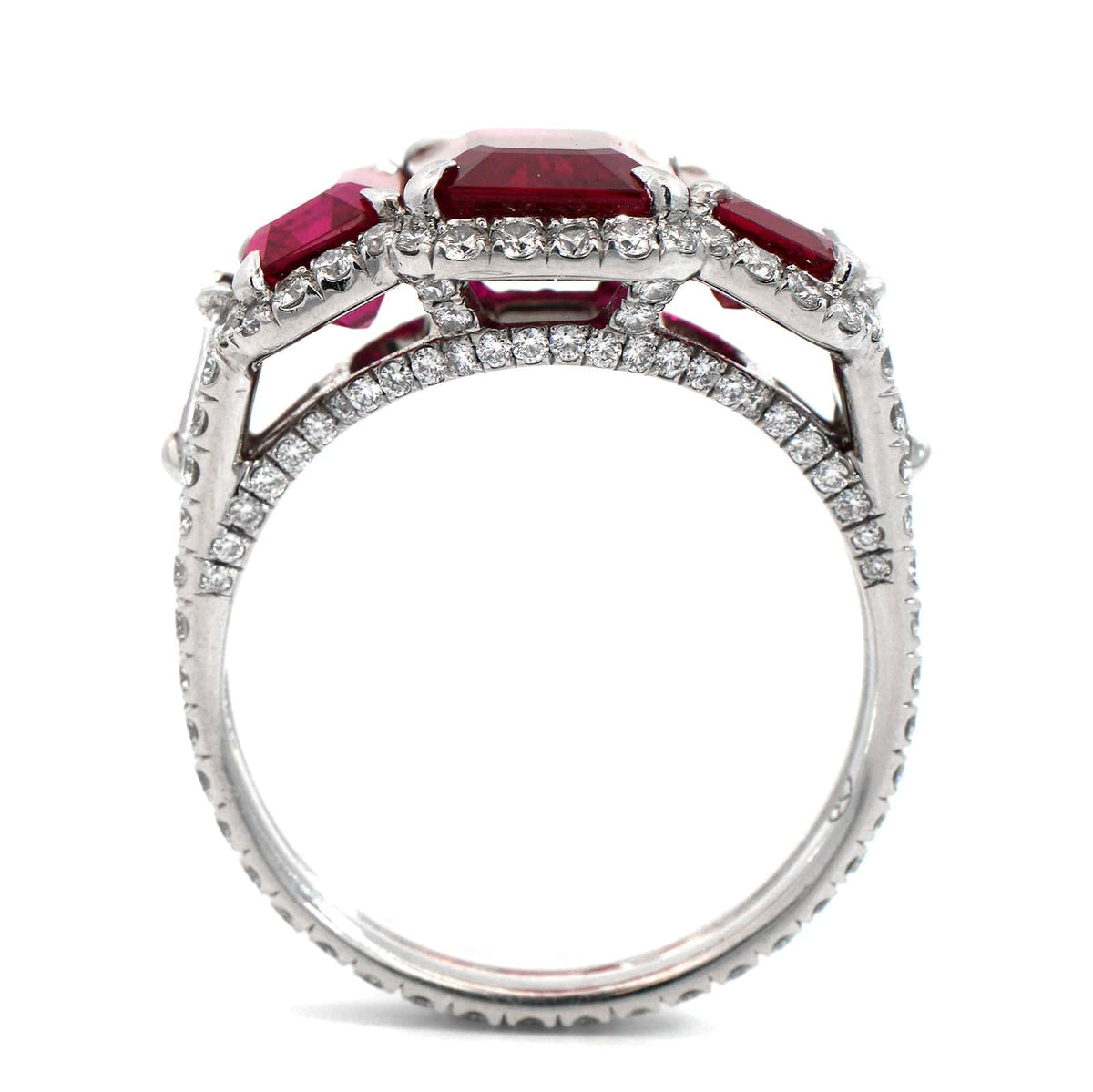 Bayco Platinum Emerald Cut Ruby and Diamond Halo 3 Stone Ring