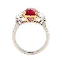 Platinum and 18K Yellow Gold Oval Ruby & Diamond Three Stone Ring