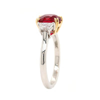 Platinum and 18K Yellow Gold Oval Ruby & Trap Cut Diamond Three Stone Ring