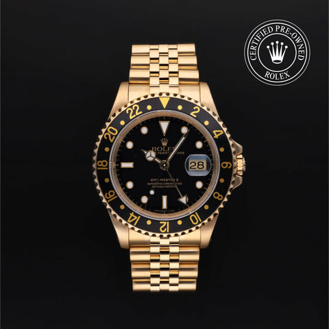 Rolex Certified Pre-Owned GMT Master II in Jubilee, 40 mm, 18k yellow gold 16718LN watch available at Long's Jewelers.