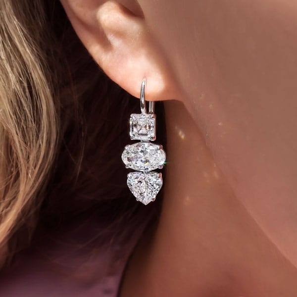 Diamond drop earrings with square, oval, and heart cut diamonds