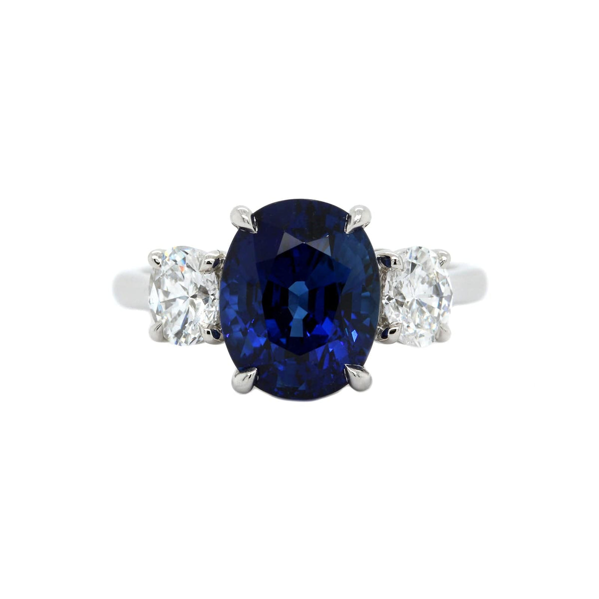 Platinum 3 Stone Oval Blue Sapphire and Diamond Ring
