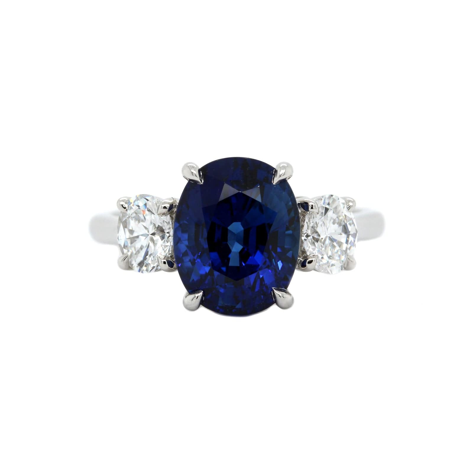 Platinum 3 Stone Oval Blue Sapphire and Diamond Ring