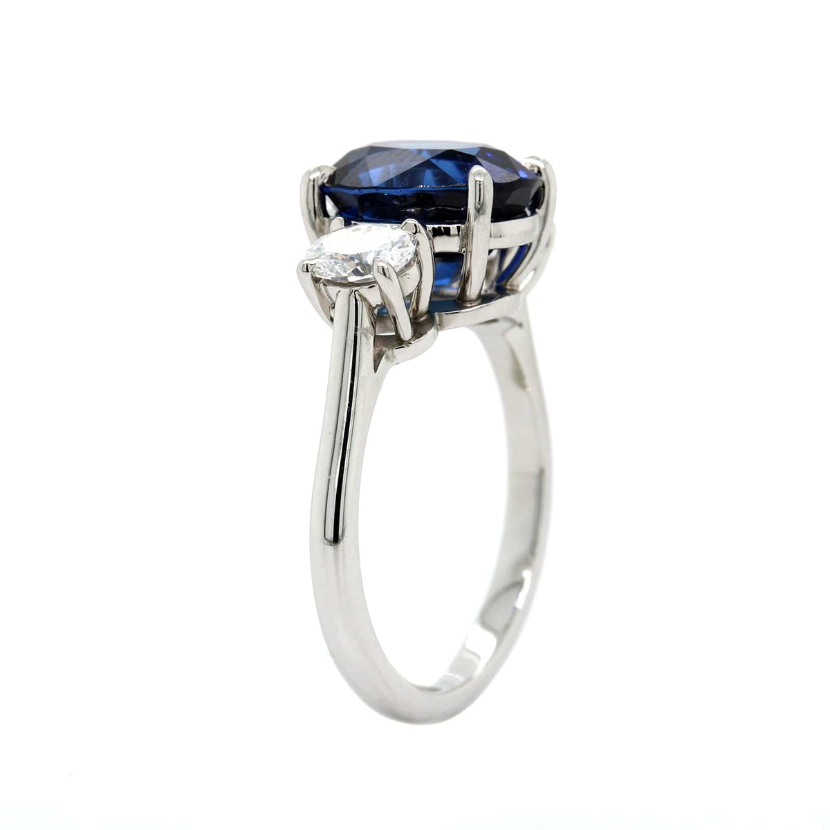 Platinum 3 Stone Oval Blue Sapphire and Diamond Ring