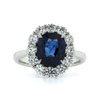Platinum Oval Sapphire Diamond Halo Ring
