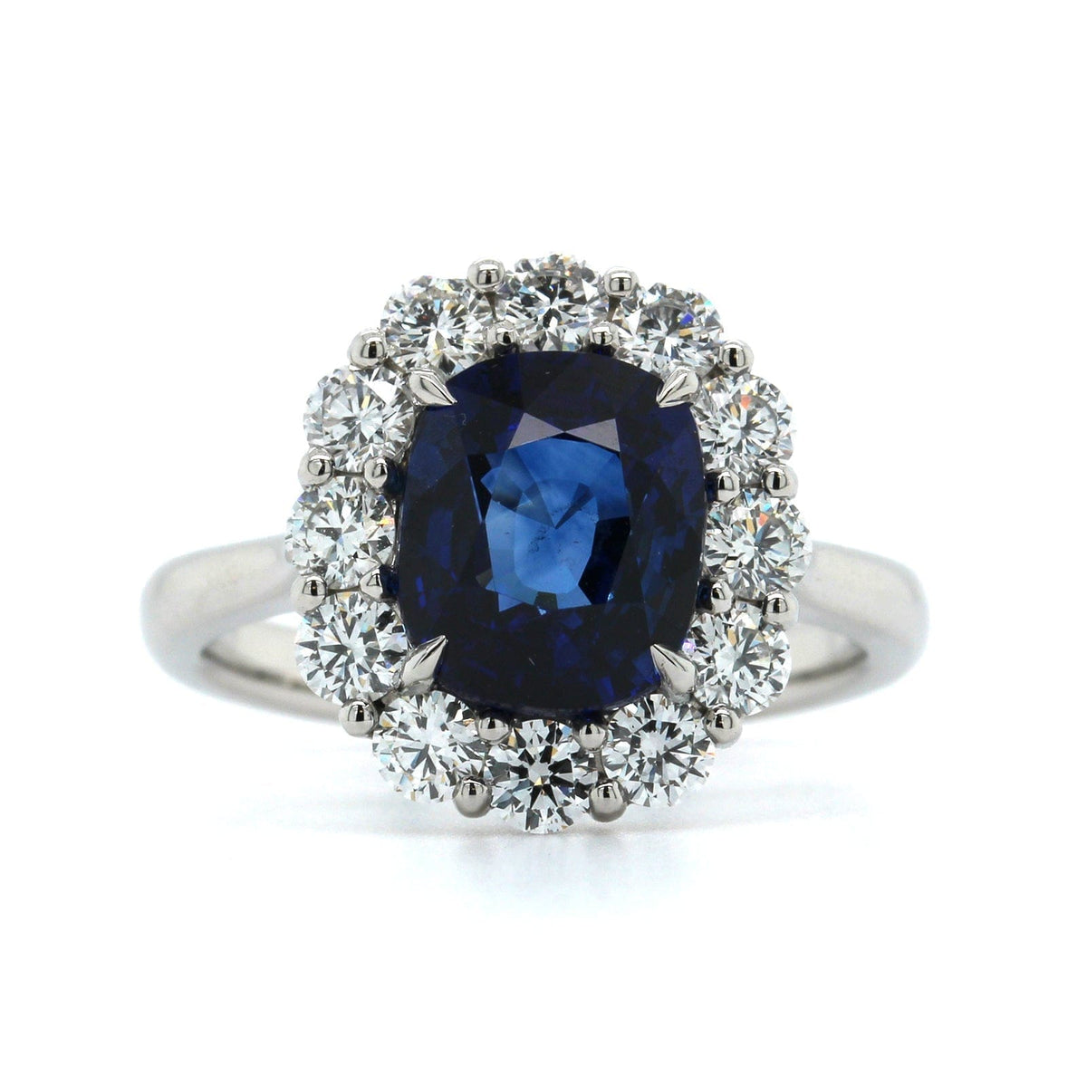 Platinum Oval Sapphire Diamond Halo Ring