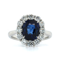 Platinum Oval Sapphire Diamond Halo Ring