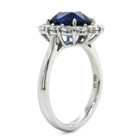 Platinum Oval Sapphire Diamond Halo Ring