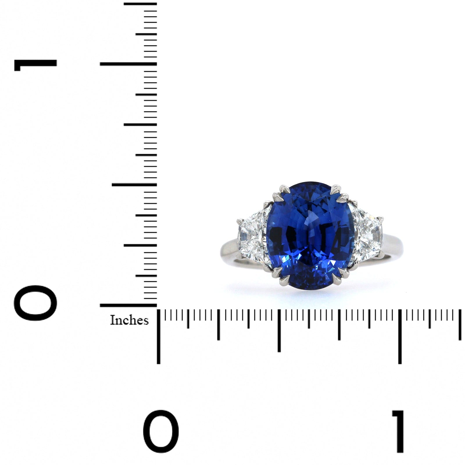Platinum Sapphire and Trapezoid Diamond 3 Stone Ring