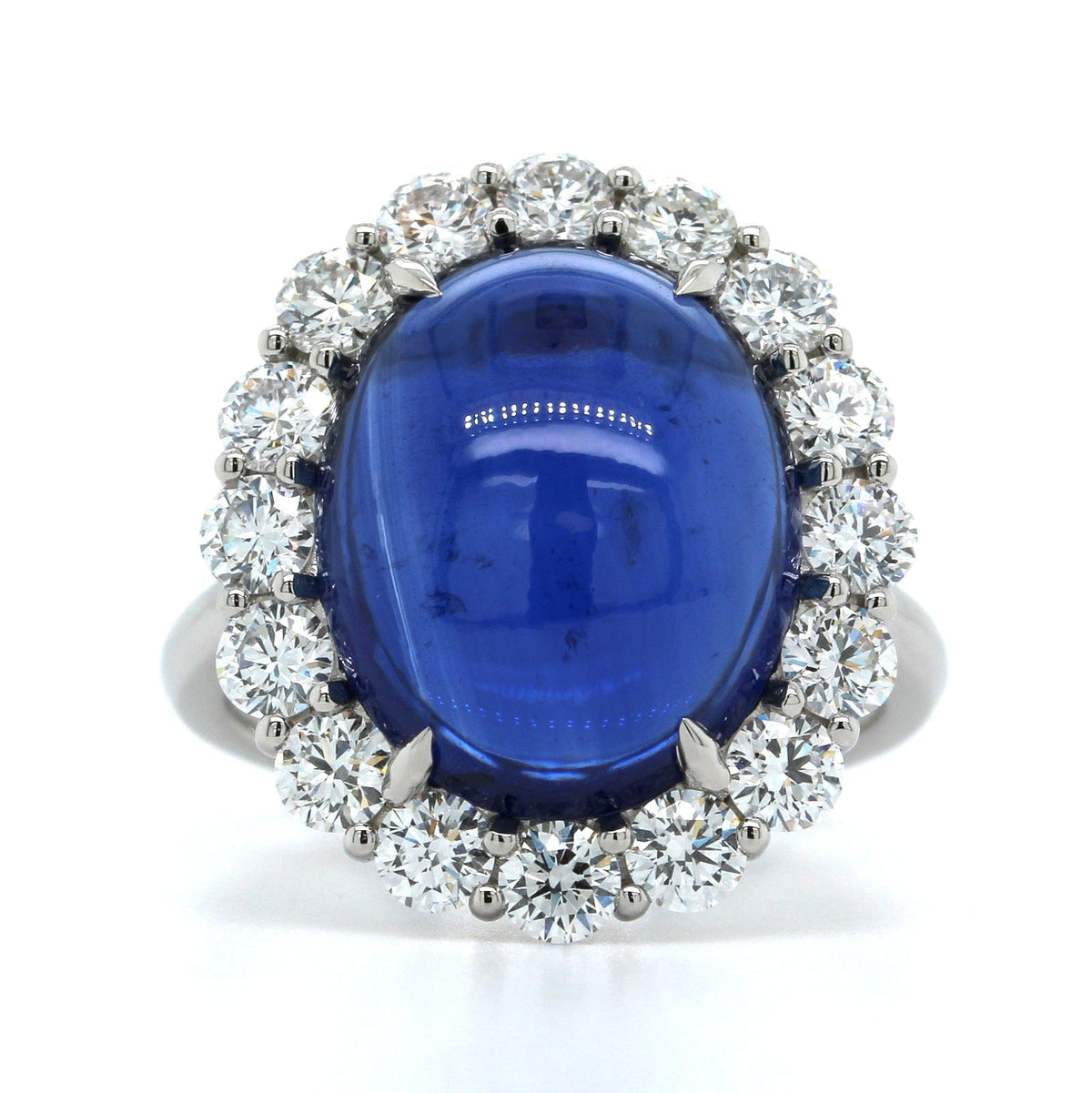 Platinum Oval Cabochon Sapphire Diamond Halo Ring