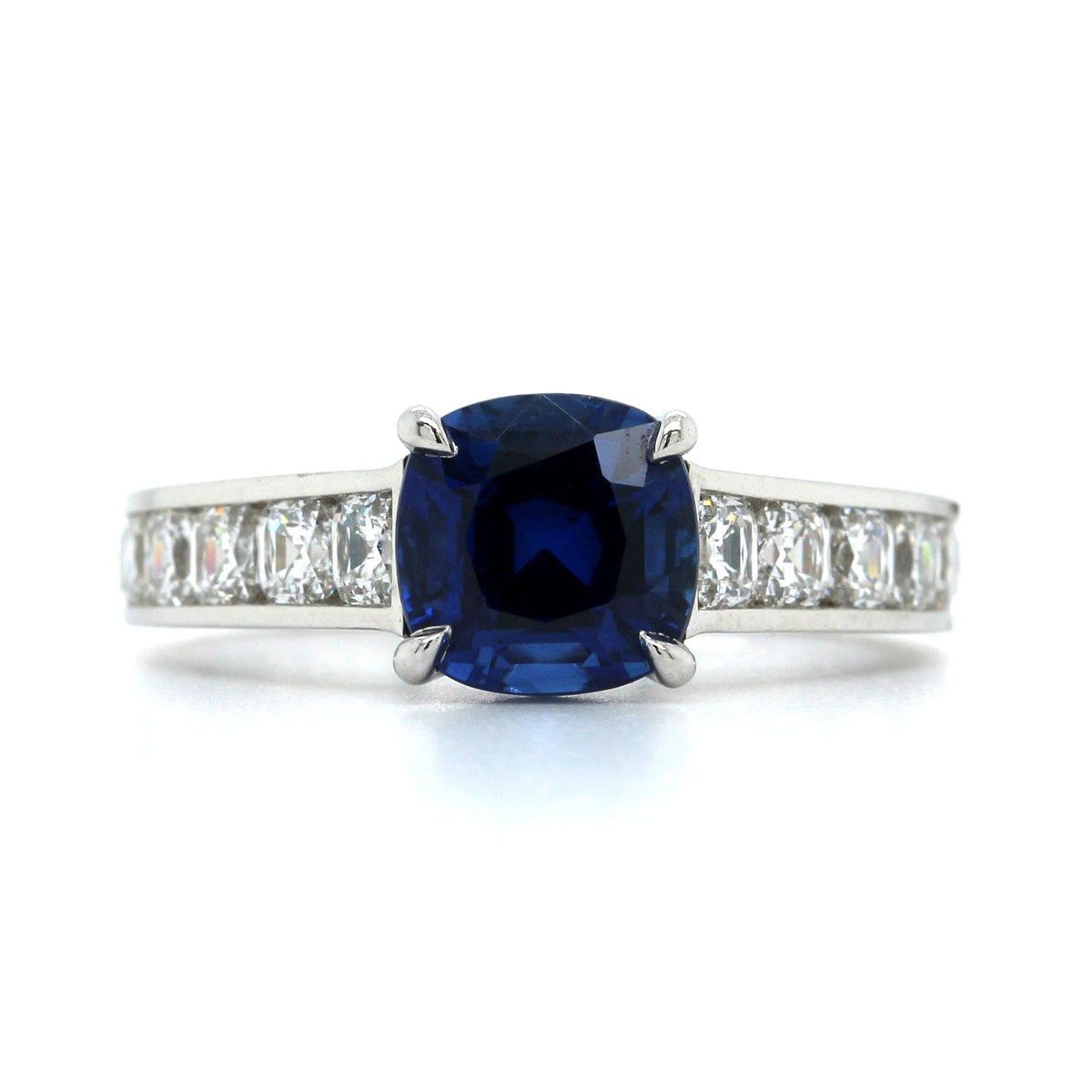 Platinum Cushion Sapphire and Channel Set Diamond Ring