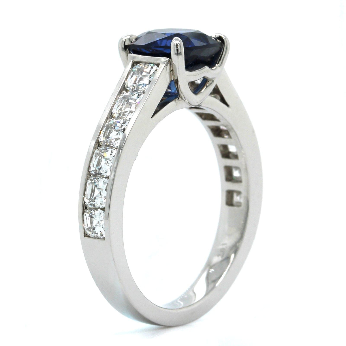 Platinum Cushion Sapphire and Channel Set Diamond Ring