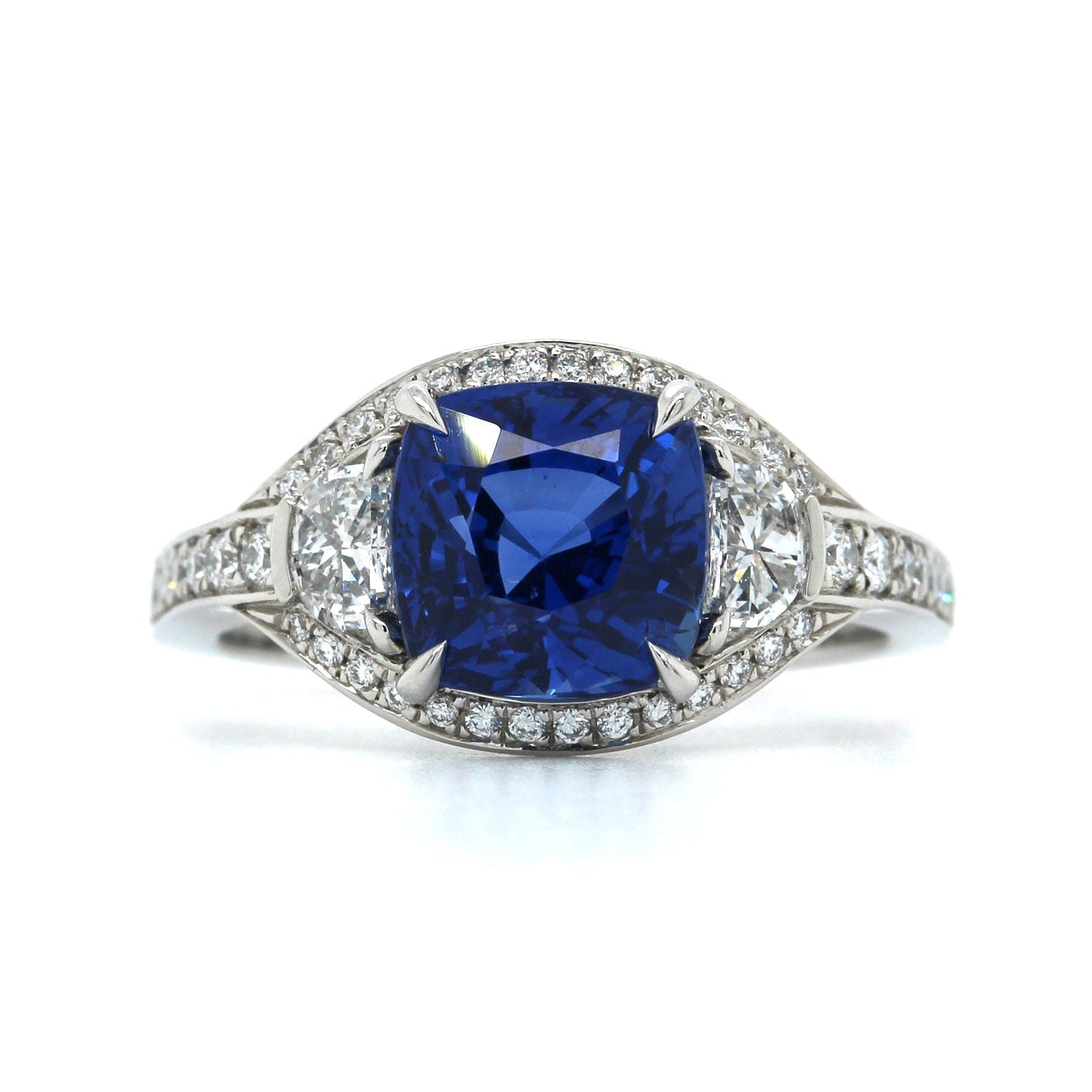 Platinum Blue Sapphire and Diamond Halo Ring