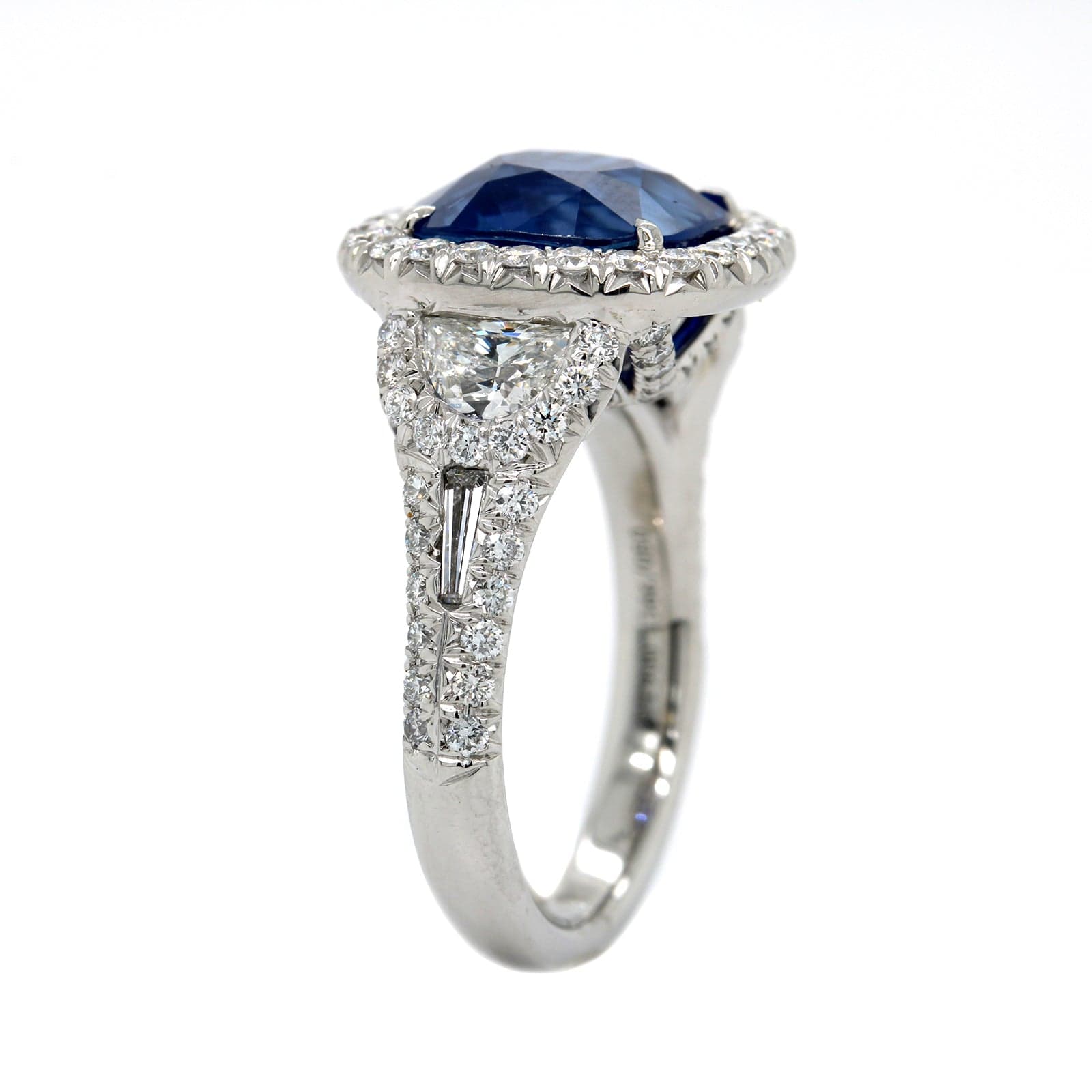 Platinum Cushion Cut Sapphire and Diamond Halo Ring