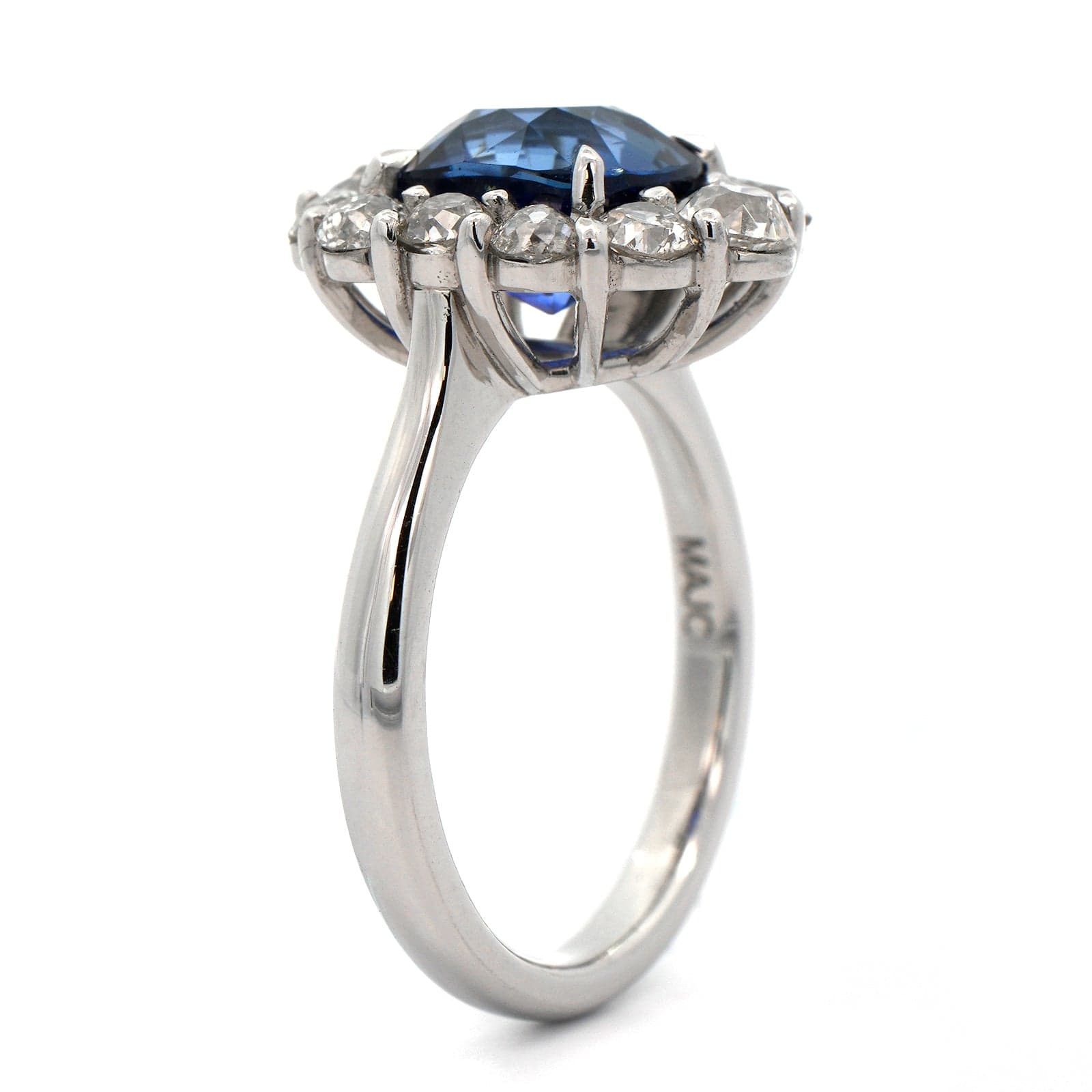 Platinum Blue Sapphire and Diamond Halo Ring