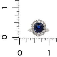 Platinum Blue Sapphire and Diamond Halo Ring
