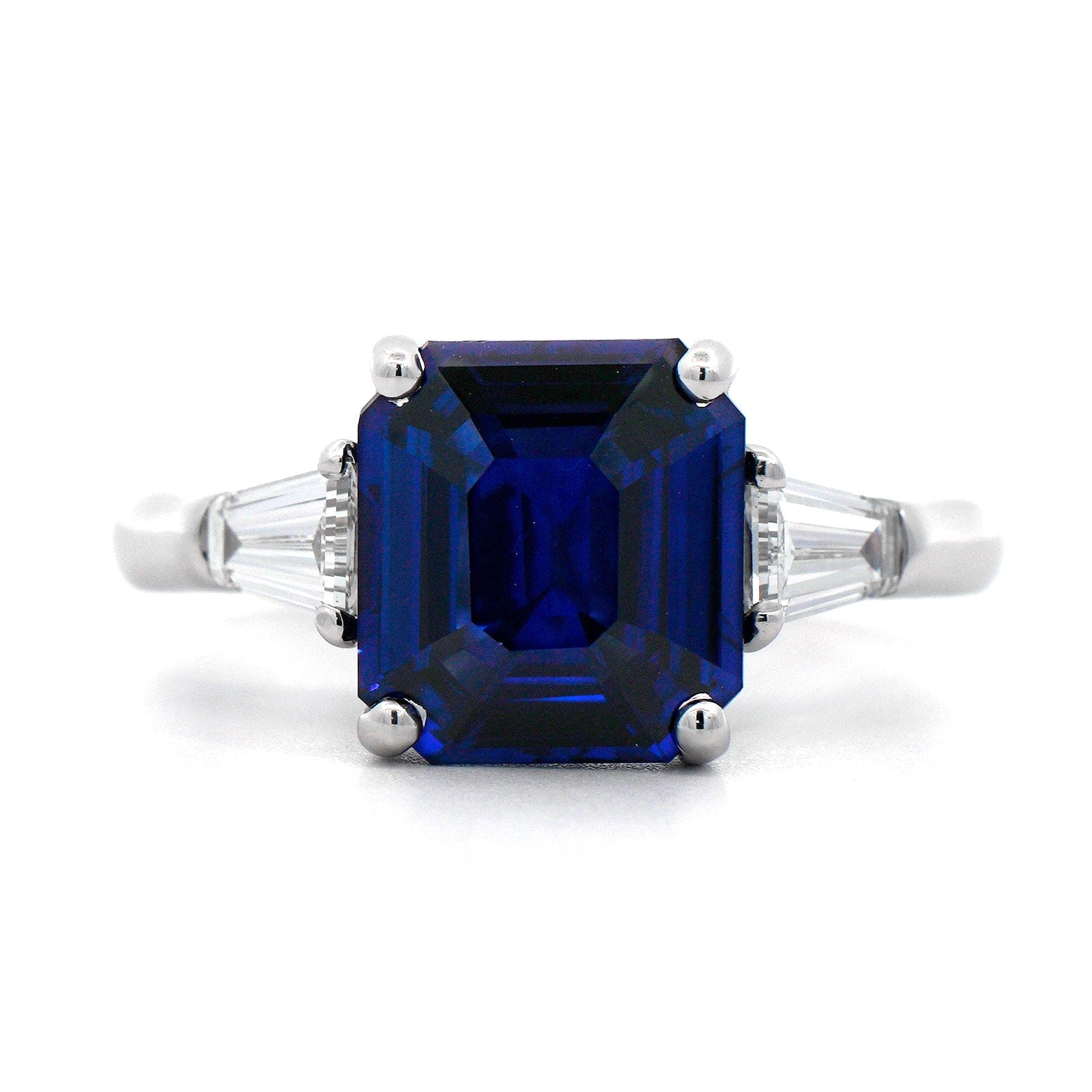 Platinum 3 Stone Emerald Cut Sapphire and Diamond Ring