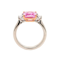 Platinum and 20K Rose Gold Three Stone Emerald Cut Sapphire and Diamond Ring