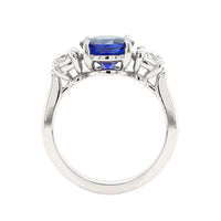 Platinum Three Stone Round Sapphire and Diamond Ring