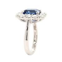 Platinum Emerald Cut Blue Sapphire and Diamond Halo Ring