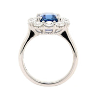 Platinum Emerald Cut Blue Sapphire and Diamond Halo Ring