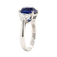 Platinum Cushion Cut Sapphire and Diamond Three Stone Ring