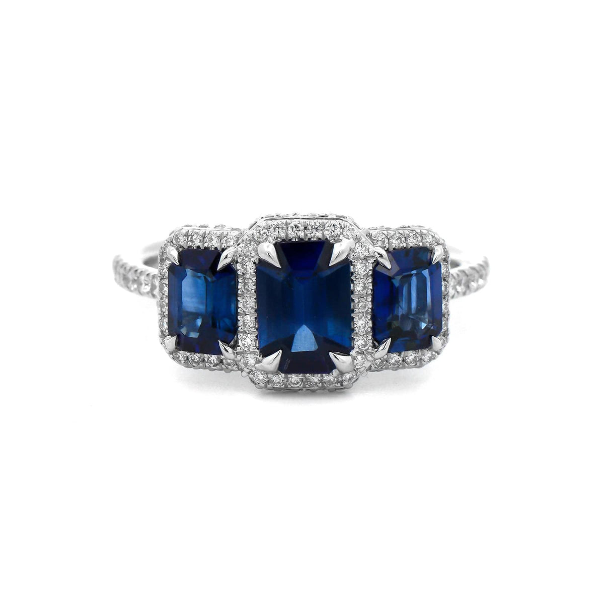 18K White Gold Three Stone Emerald Cut Blue Sapphire and Diamond Ring