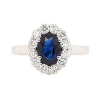 Platinum Oval Sapphire and Diamond Halo Ring