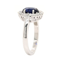 Platinum Oval Sapphire and Diamond Halo Ring