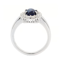 Platinum Oval Sapphire and Diamond Halo Ring