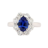 Platinum Oval Sapphire and Diamond Halo Ring