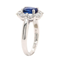 Platinum Oval Sapphire and Diamond Halo Ring