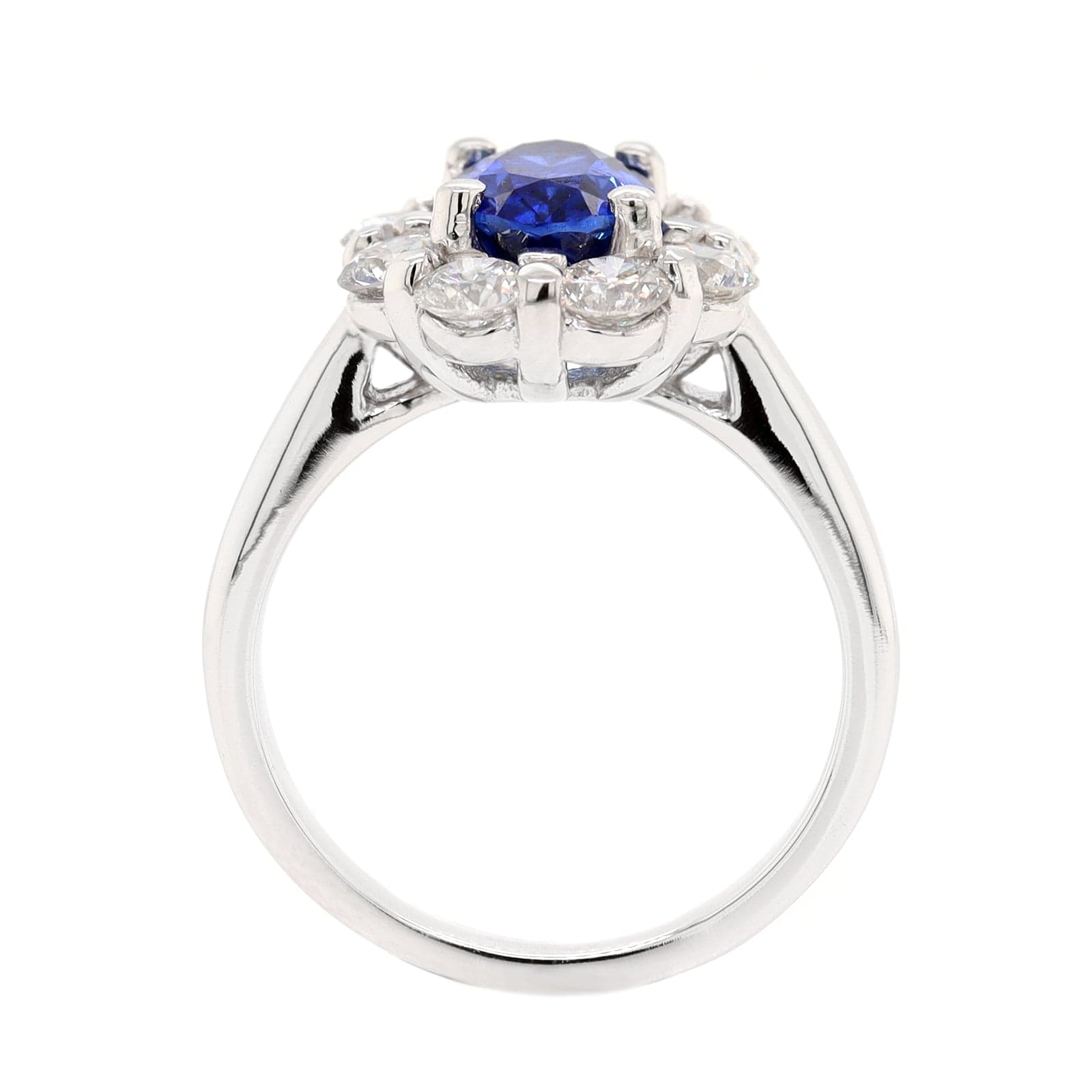 Platinum Oval Sapphire and Diamond Halo Ring