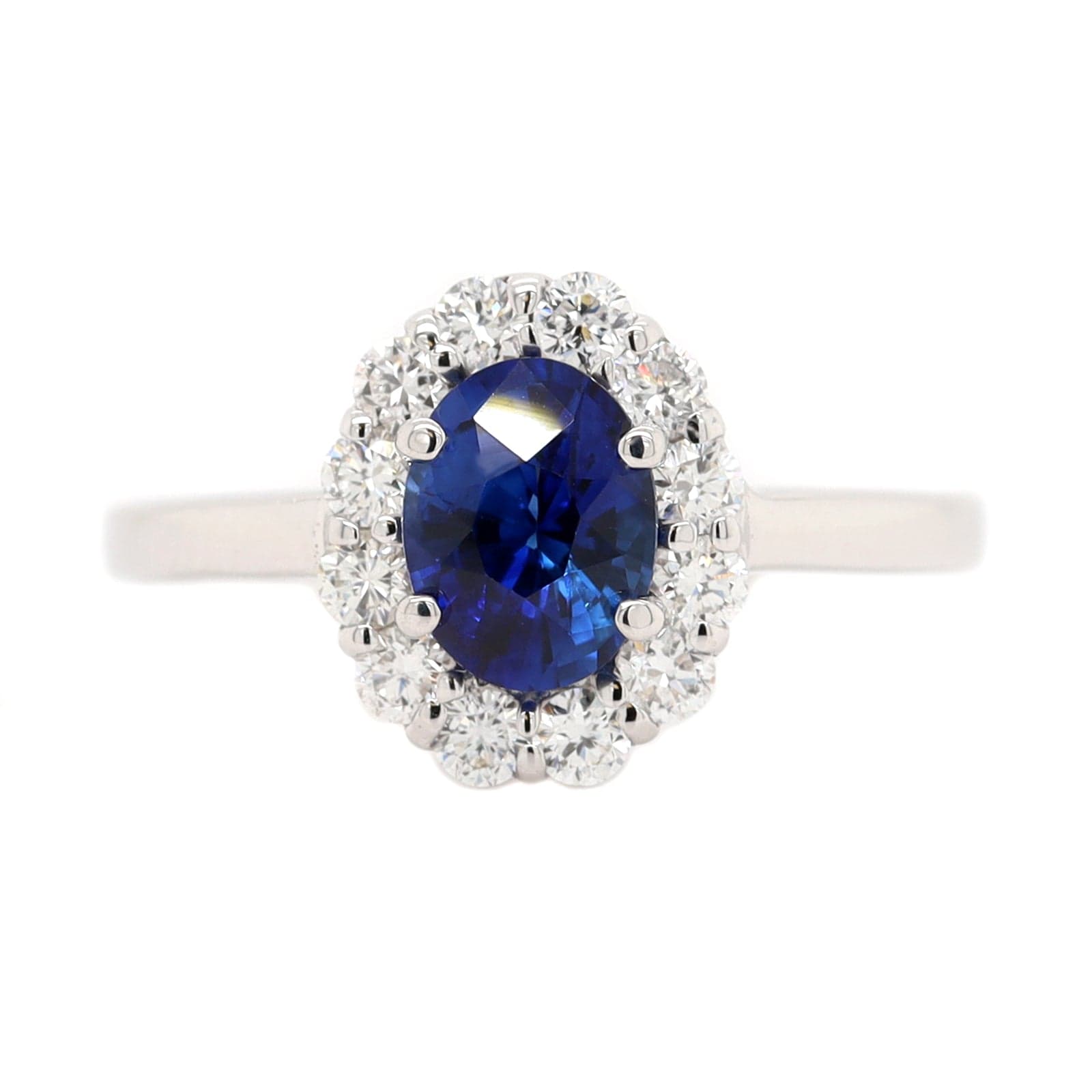 18K White Gold Oval Sapphire and Diamond Halo Ring