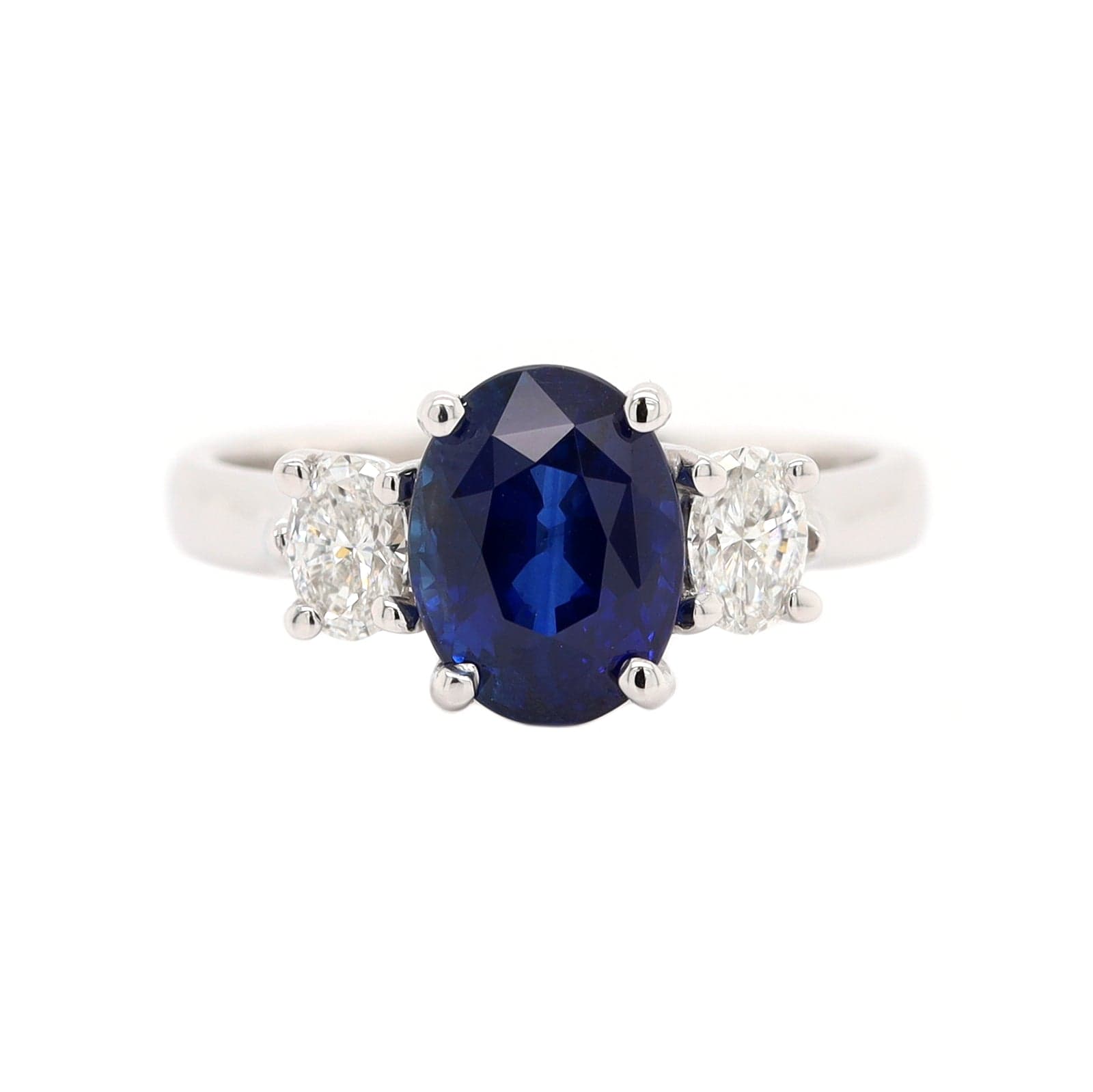 Platinum Three Stone Oval Sapphire and Diamond Ring