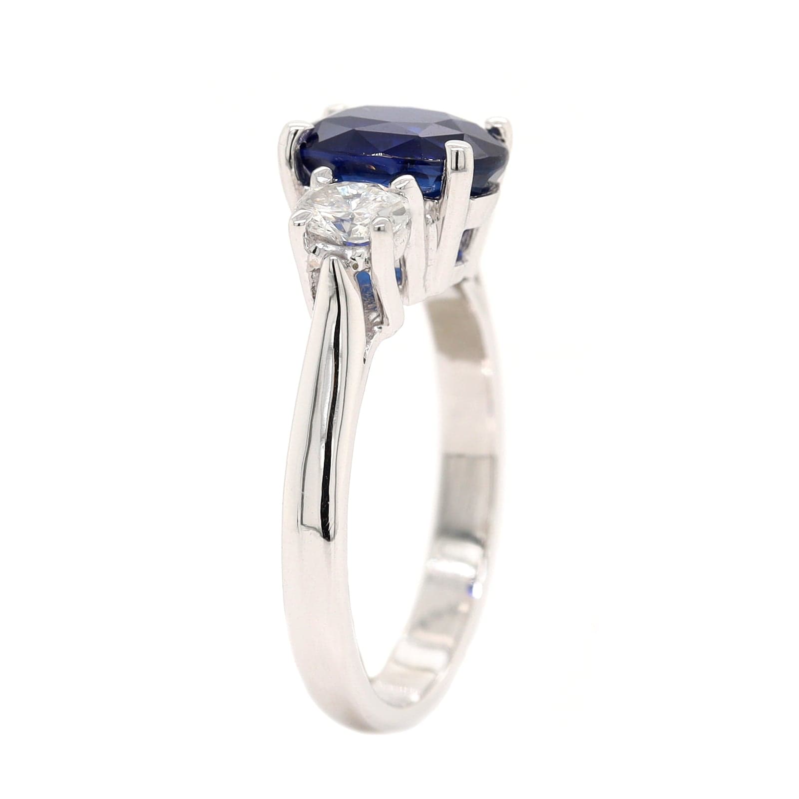 Platinum Three Stone Oval Sapphire and Diamond Ring