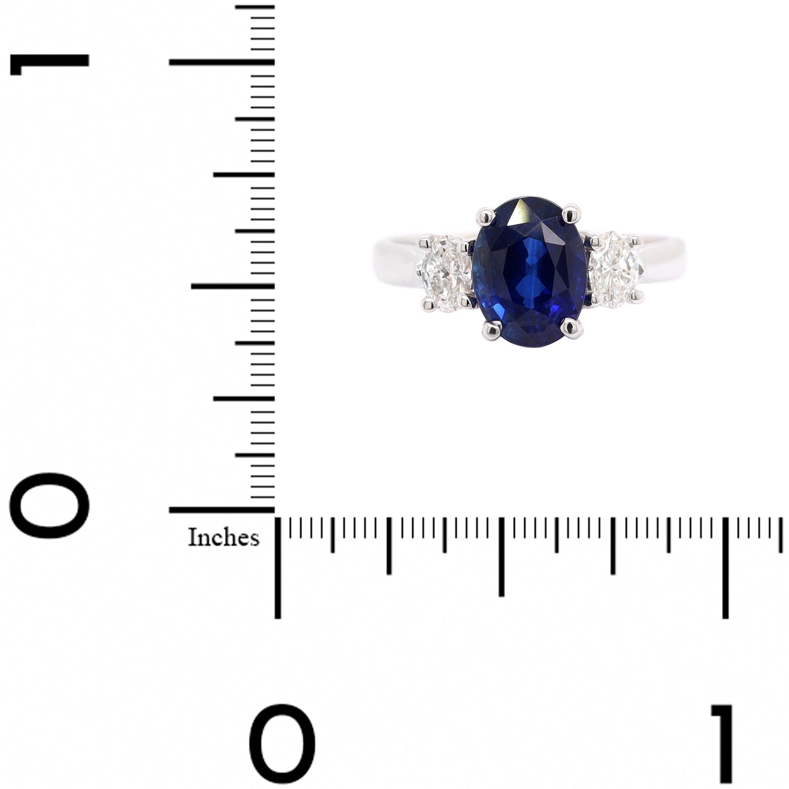 Platinum Three Stone Oval Sapphire and Diamond Ring