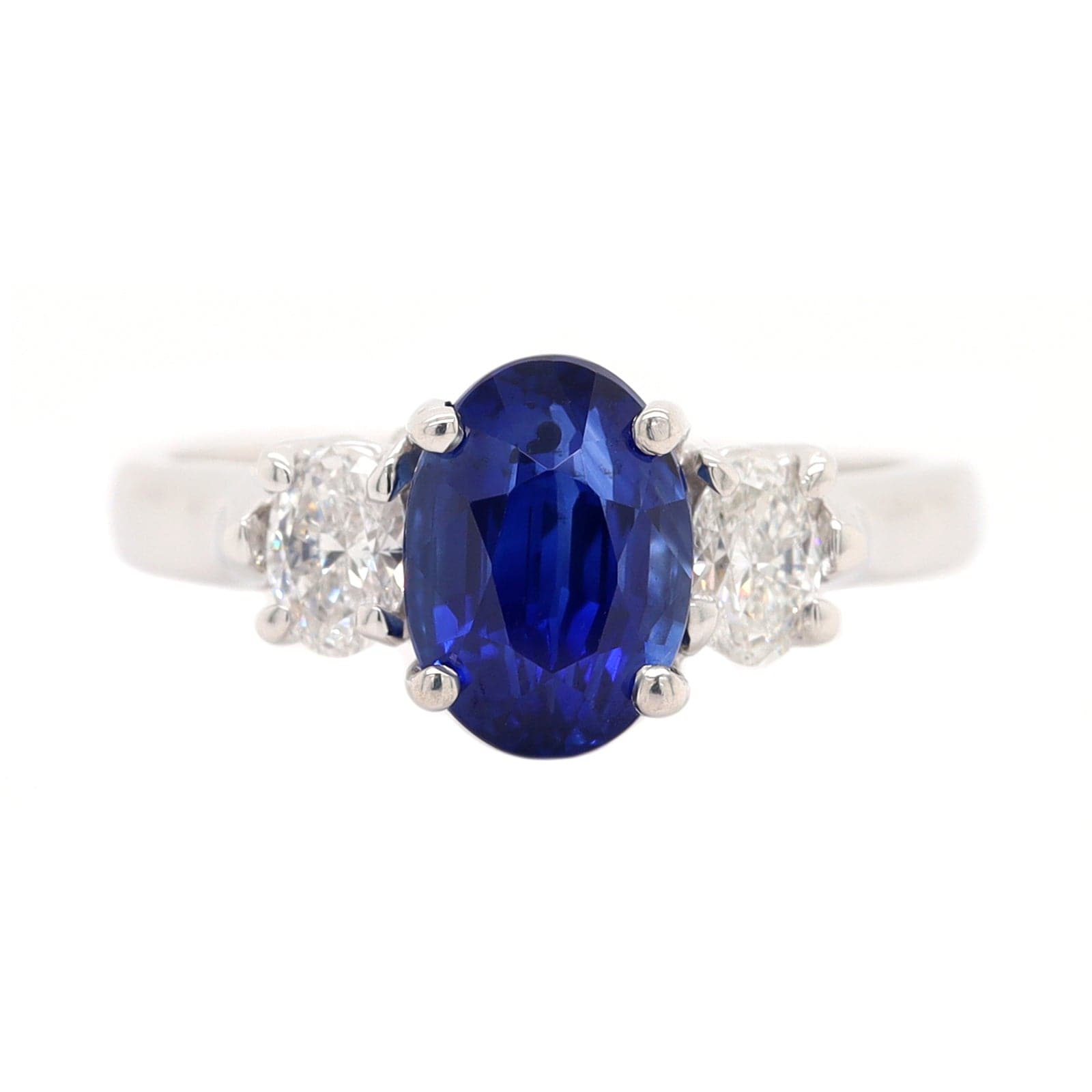 Platinum Three Stone Oval Sapphire and Diamond Ring