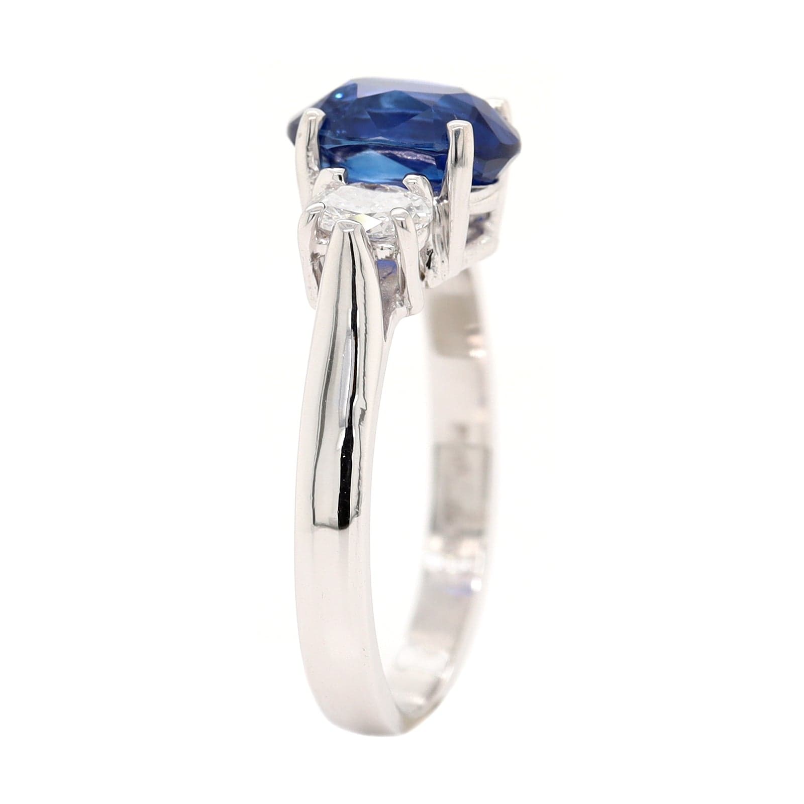 Platinum Three Stone Oval Sapphire and Diamond Ring