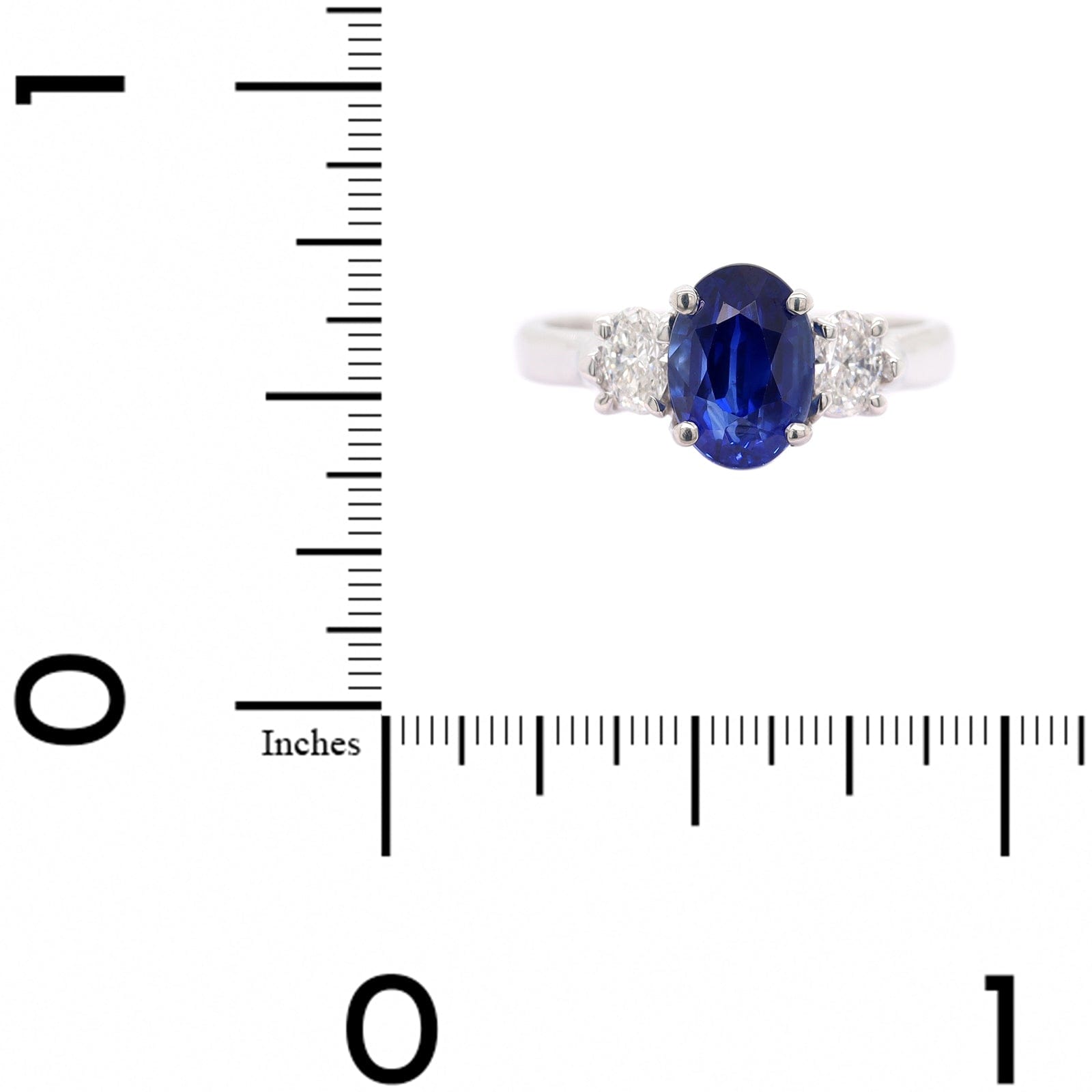 Platinum Three Stone Oval Sapphire and Diamond Ring