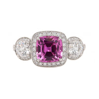 Platinum Three Stone Cushion Shaped Pink Sapphire and Diamond Halo Ring