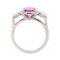 Platinum Three Stone Cushion Shaped Pink Sapphire and Diamond Halo Ring
