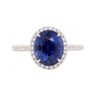 Platinum Oval Blue Sapphire and Diamond Halo Ring
