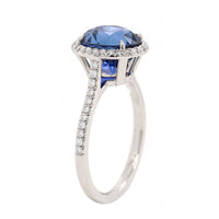 Platinum Oval Blue Sapphire and Diamond Halo Ring