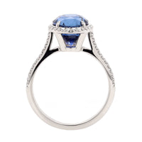 Platinum Oval Blue Sapphire and Diamond Halo Ring