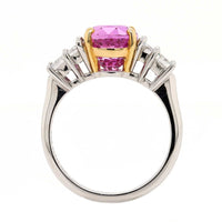 Platinum Three Stone Oval Shaped Pink Sapphire and Diamond Ring
