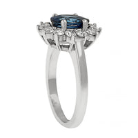 Platinum Oval Blue Sapphire and Diamond Halo Ring