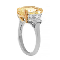Platinum and 18K Yellow Gold Three Stone Oval Shaped Yellow Sapphire and Diamond Ring